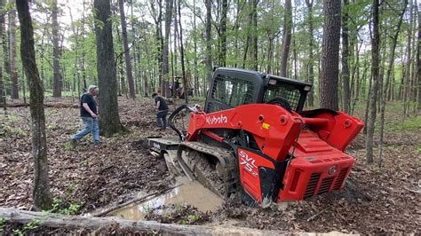 skid steer stuck in mud recovery